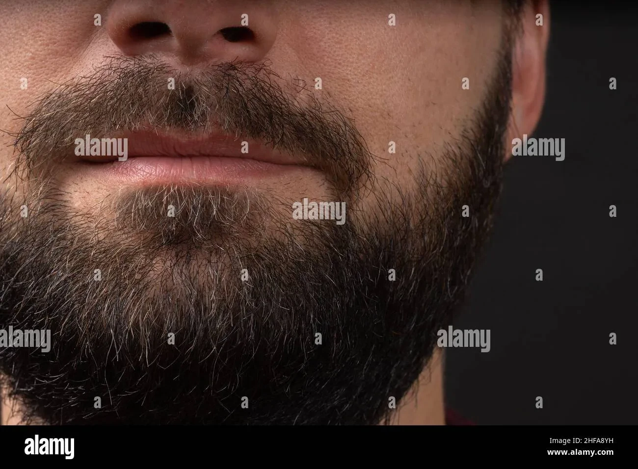 Man with a well-groomed thin beard 2024